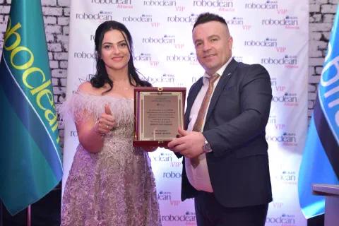 Plaque presentation at a Roboclean ceremony